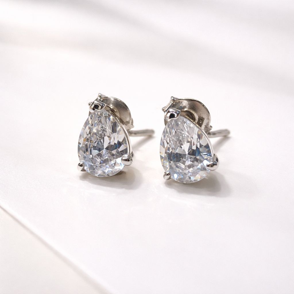 Sleek unisex Sterling Silver Pear Stud 1