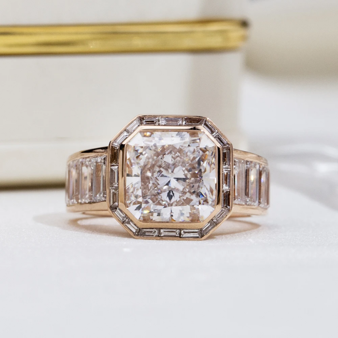 Asscher Cut Bezel-Set Ring Asscher Cut Bezel-Set Ring with Baguette Halo in Gold