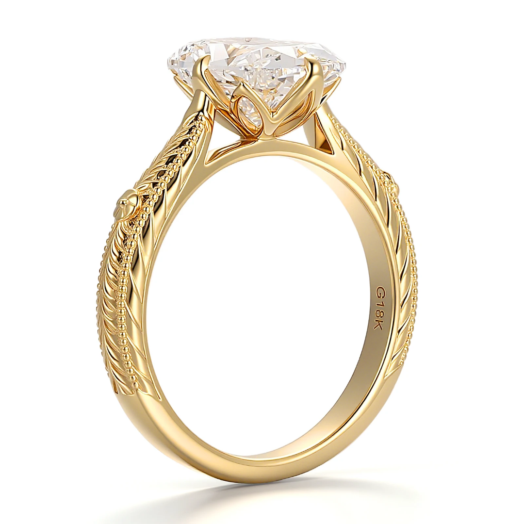 Elongated Cushion Cut Engraved Solitaire Ring Elongated Cushion Cut Engraved Solitaire Ring in Yellow Gold