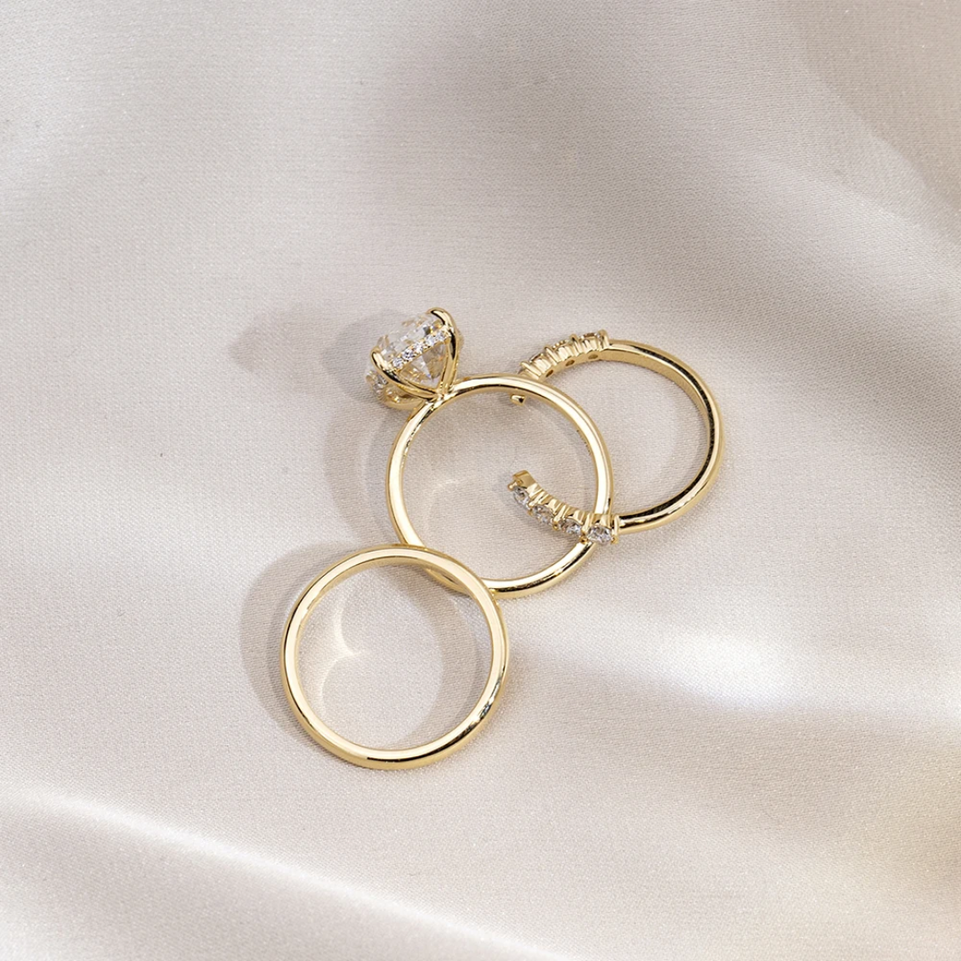 Oval Cut 3-Piece Bridal Set Oval Cut 3-Piece Bridal Set in Yellow Gold